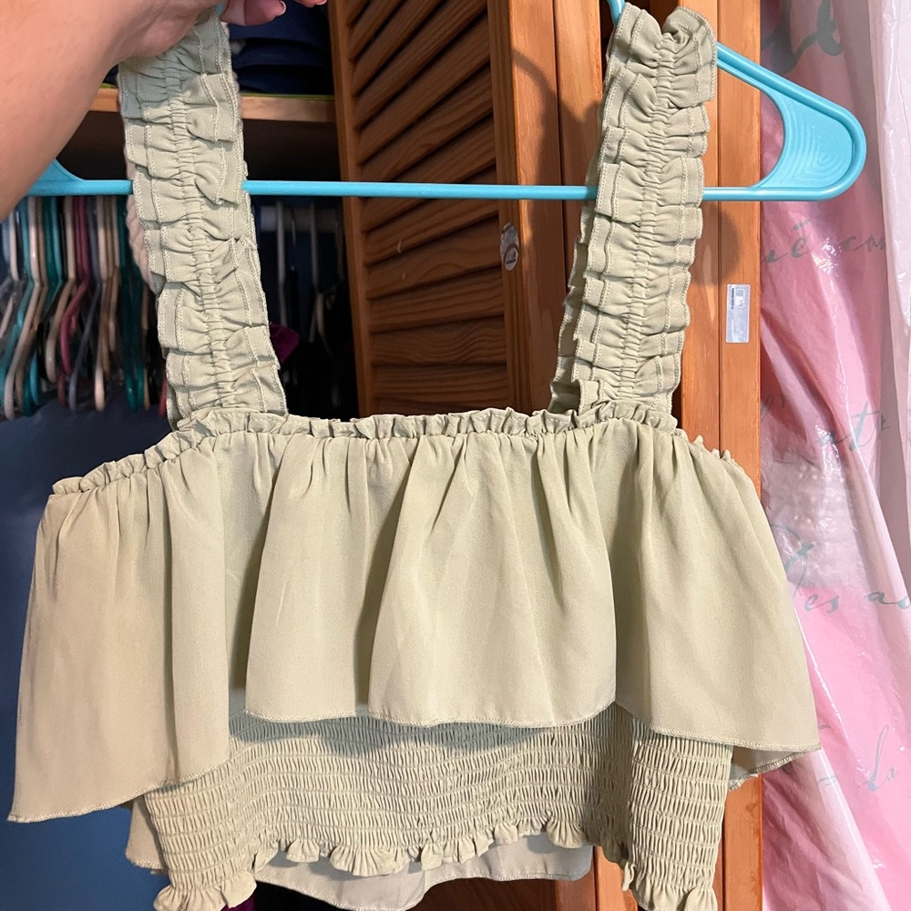Light green ruffled crop top